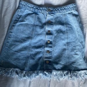 Size 2/3 light blue denim mini skirt with fringe